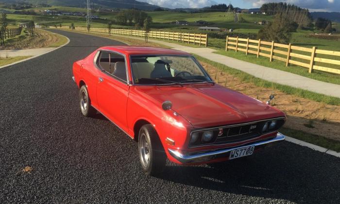 1973 Red Datsun 180B Coupe Hardtop non sss Switzerland (1).jpg