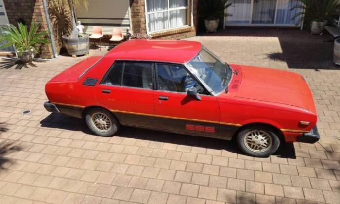 1981 Datsun Stanza SSS Sedan Australia Red on black images (4).JPG