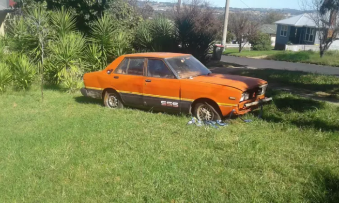 1982 Datsun Stanza SSS sedan red unrestored rusty NSW 2021 (1).png