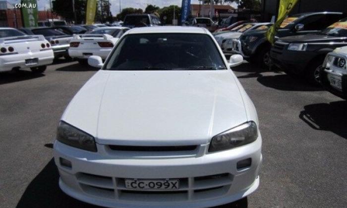 4 door R34 GT-T white Front end.jpg