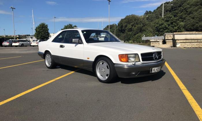 Mercedes 560SEC white on grey with maroon interior images (1).jpg