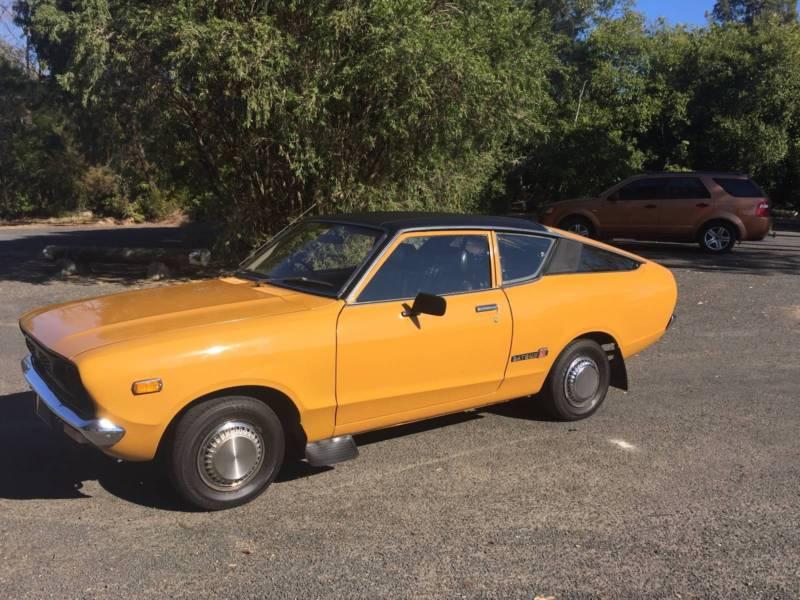 1 1974 Datsun 120Y Coupe fastback orange paint images original (1).JPG