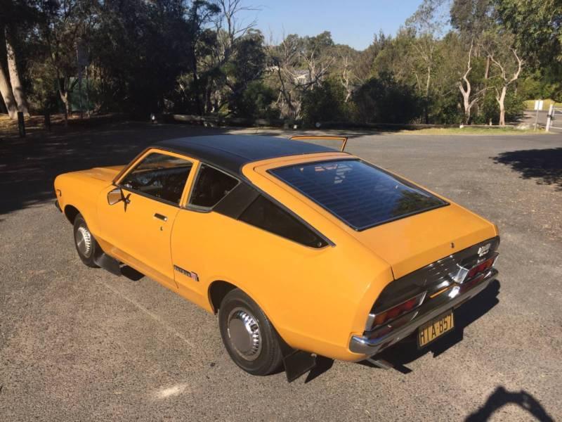 1 1974 Datsun 120Y Coupe fastback orange paint images original (2).JPG