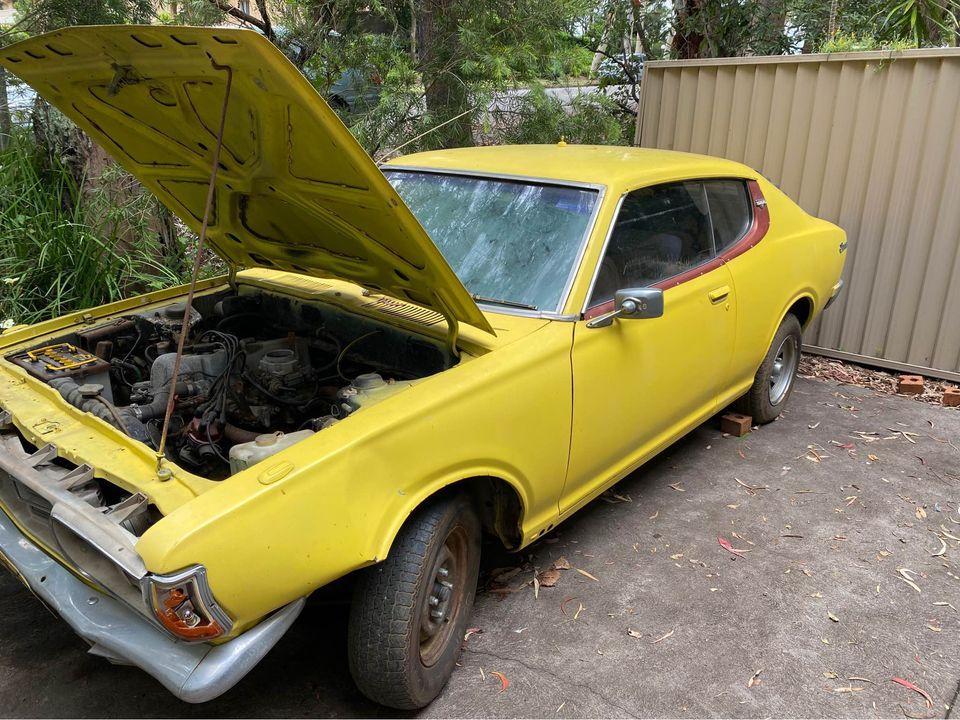 1973 Datsun 180B Coupe SSS yellow paint project 2022 for sale (1).jpg