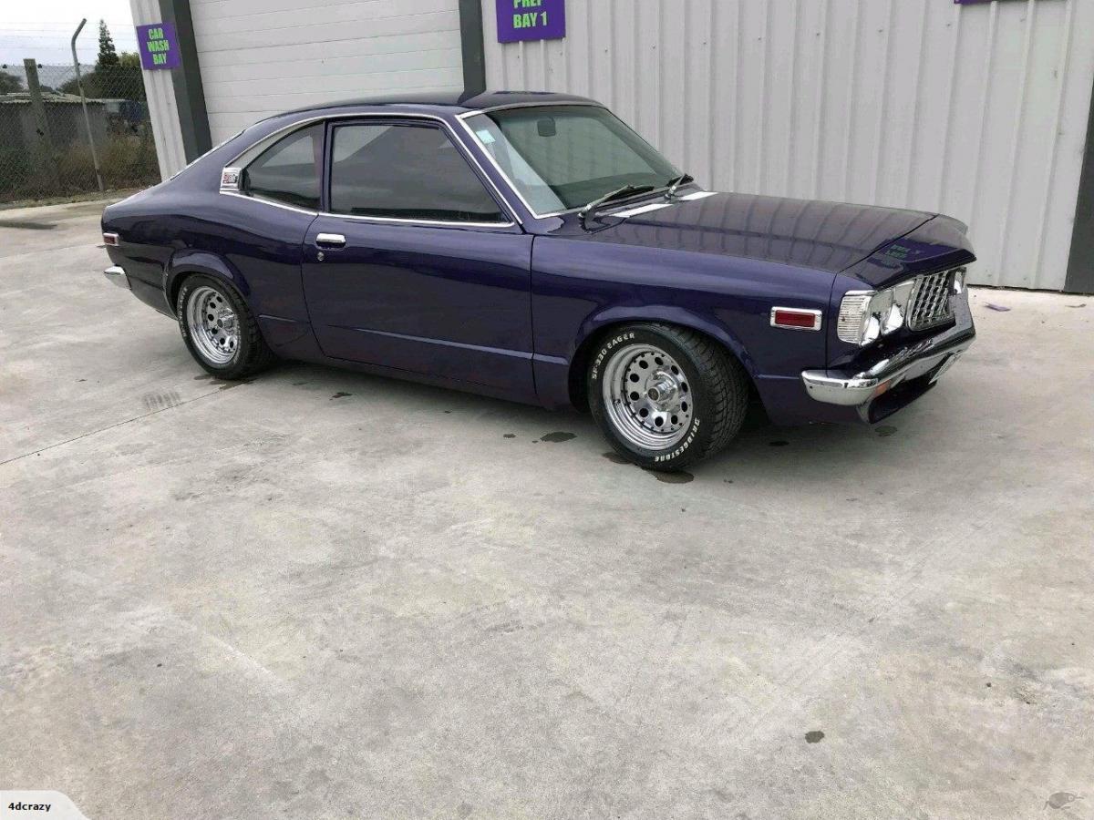 1973 Mazda RX3 series 2 restored NZ purple (1).jpg