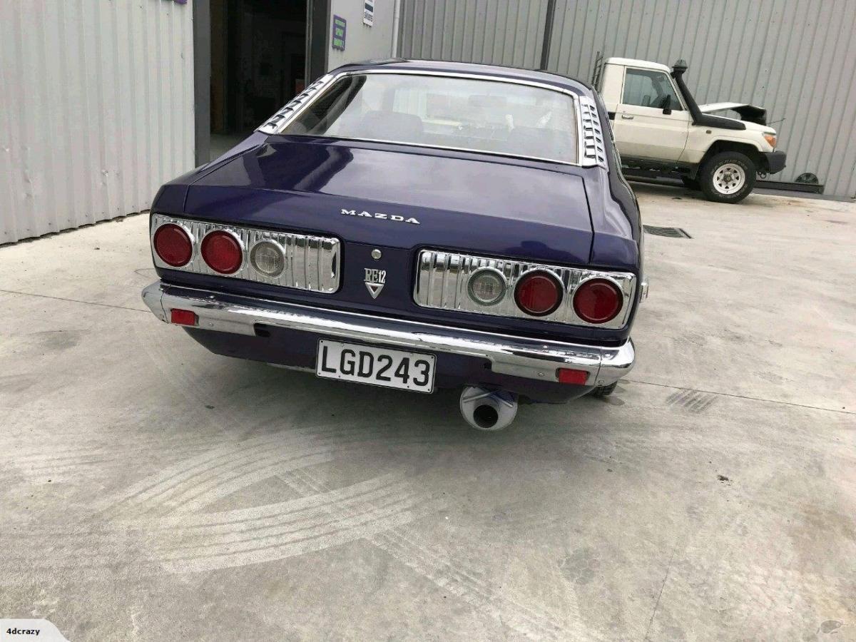 1973 Mazda RX3 series 2 restored NZ purple (3).jpg