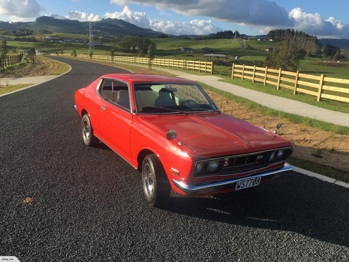 1973 Red Datsun 180B Coupe Hardtop non sss Switzerland (1).jpg