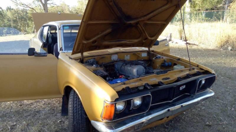 1974 Datsun 180B SSS Coupe in burnt Orange images unrestored (3).JPG