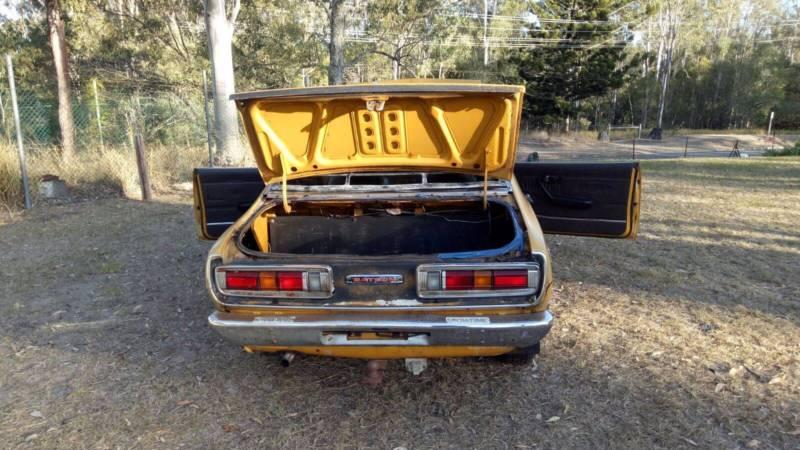 1974 Datsun 180B SSS Coupe in burnt Orange images unrestored (4).JPG