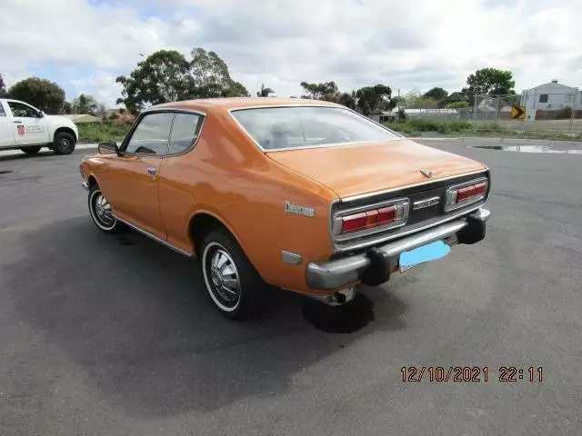 1974 Datsun 180B SSS otrange coupe for sale Australia (4).png