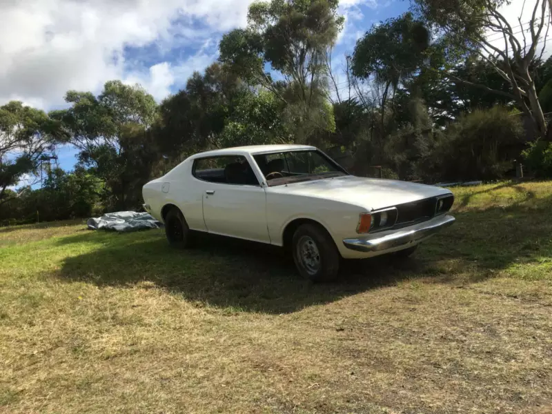 1975 Datsin 180B SSS coupe White Australia 2021 unrestored pictures (1).png