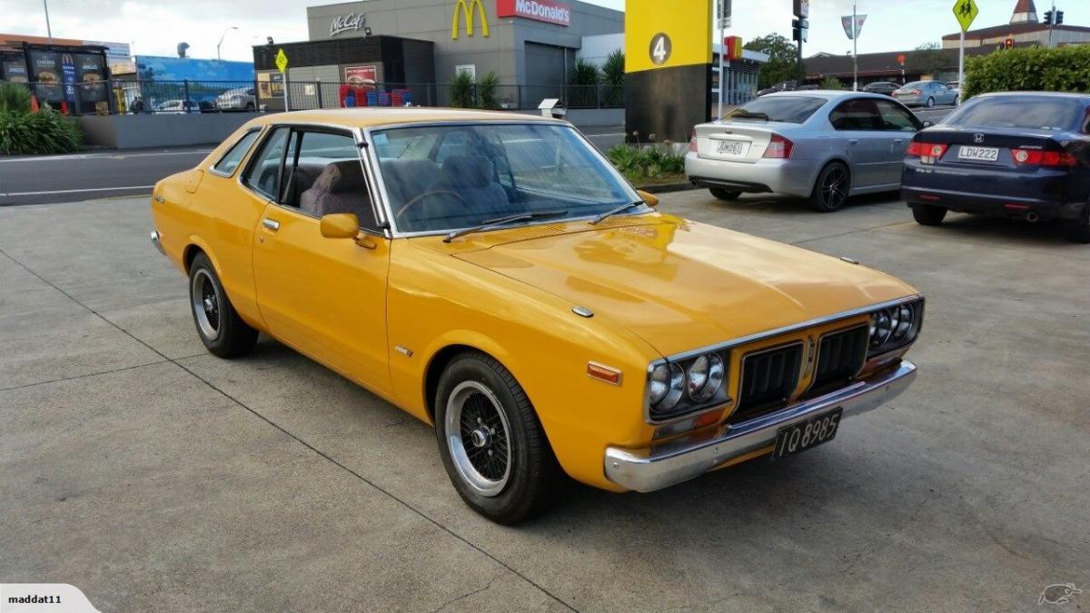 1977 Datsun 180B SSS KP810 New Zealand model orange (1).jpg