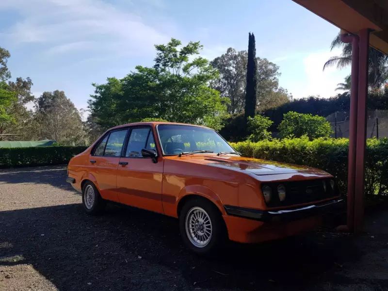 1979 Ford Escort MK2 RS2000 Sedan Burnt orange Australia 2018 (2).png