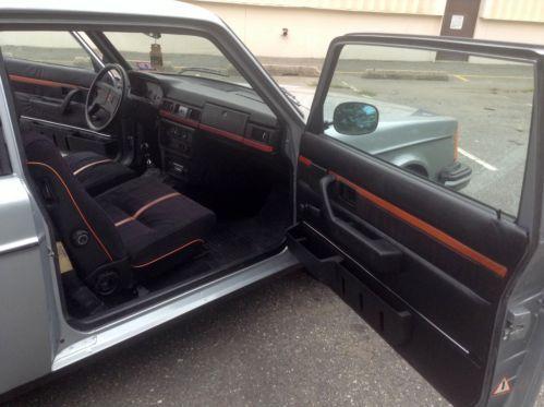 1979 Volvo 242 GT coupe Silver with black and red interior (5).jpg