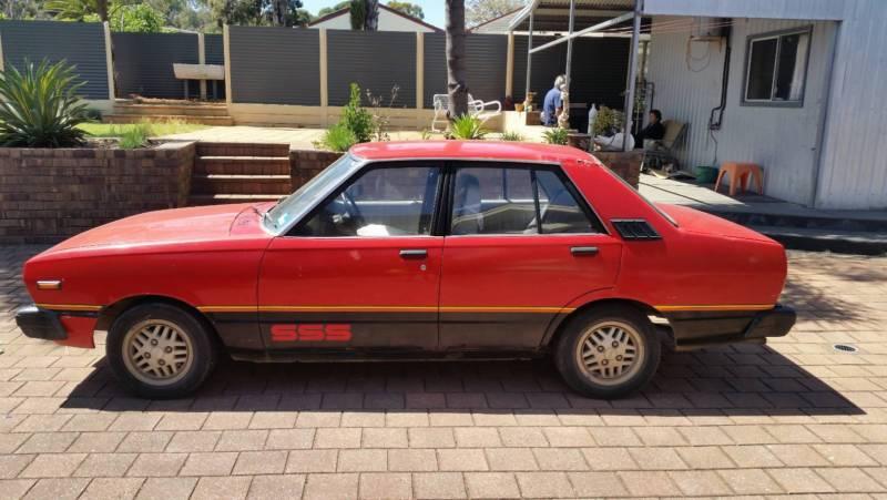 1981 Datsun Stanza SSS Sedan Australia Red on black images (1).JPG