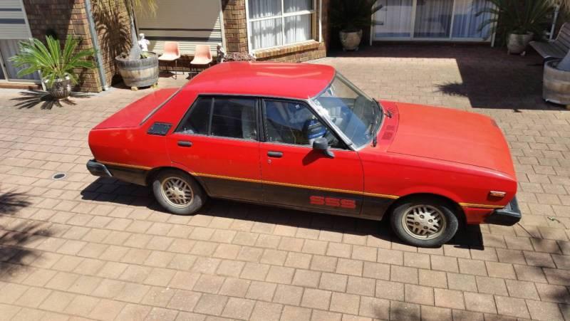 1981 Datsun Stanza SSS Sedan Australia Red on black images (4).JPG