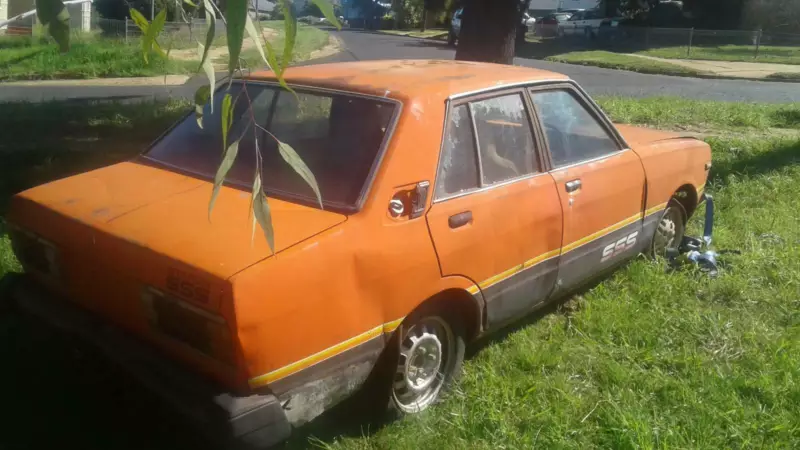 1982 Datsun Stanza SSS sedan red unrestored rusty NSW 2021 (5).png