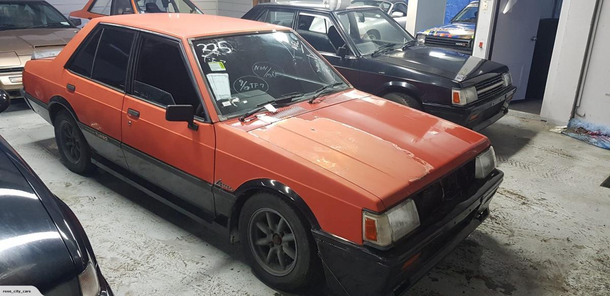 1985 Mitsubishi Lancer EX GSR Turbo Intercooled Red on black images (1).jpg