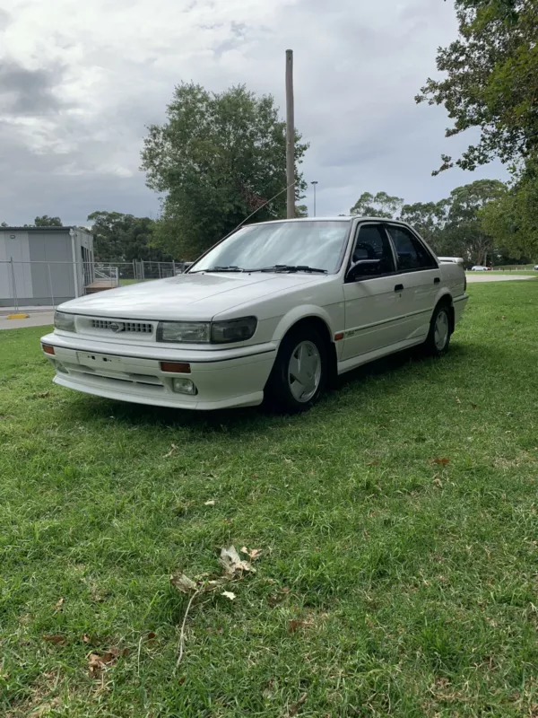 1990 White Pintara Nissan TR-X TRX (1).png