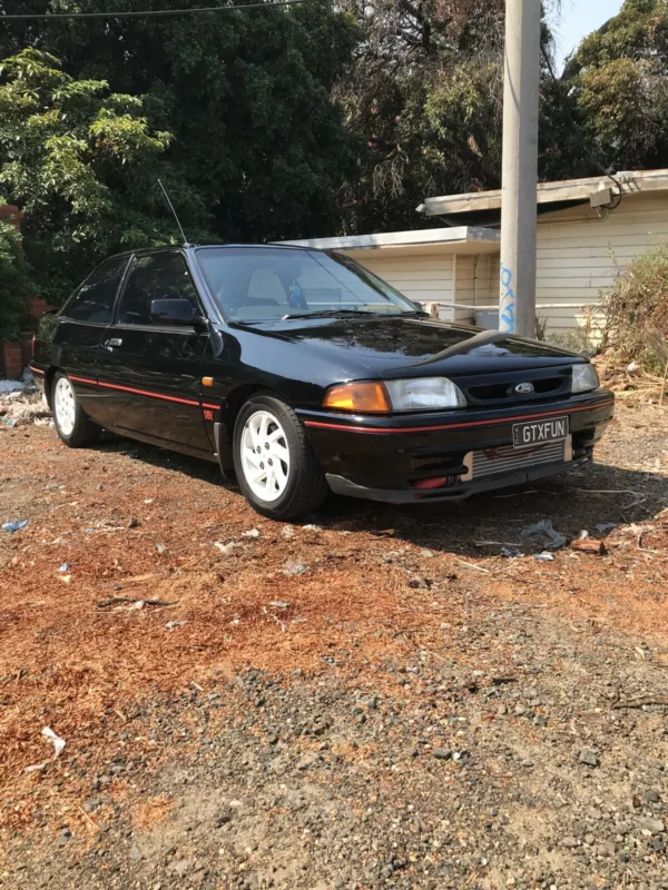 1992 Black Ford Laser TX3 KH 2021 Australia Turbo (8).png