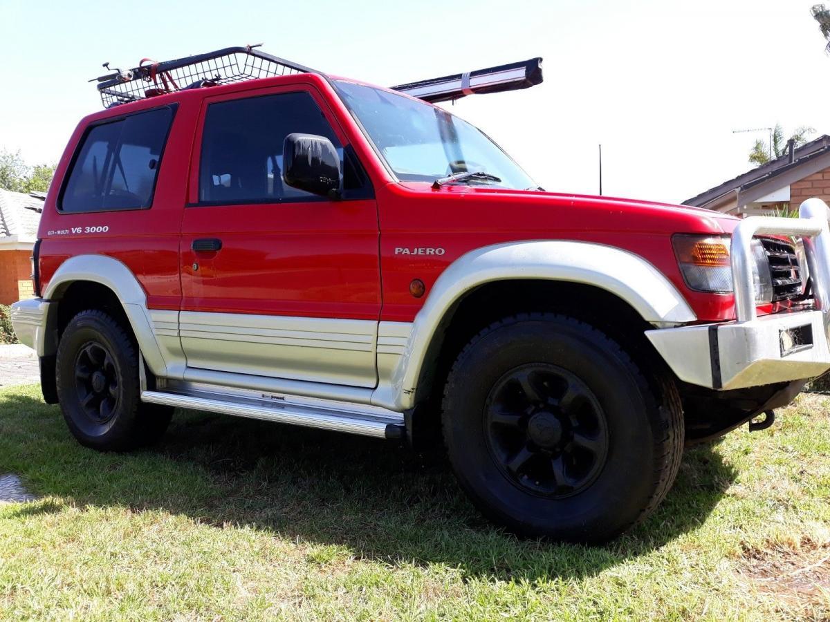 1995 SWB Gen 2 Pajero NJ red with leather images (1).jpg