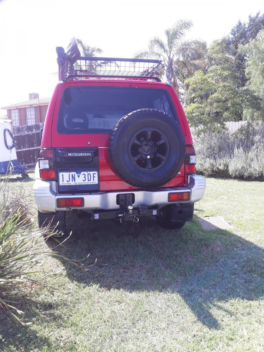 1995 SWB Gen 2 Pajero NJ red with leather images (2).jpg