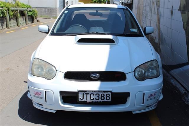 2005 White WRX STi Sedan Version 9 images (1).jpg