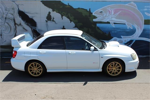 2005 White WRX STi Sedan Version 9 images (4).jpg