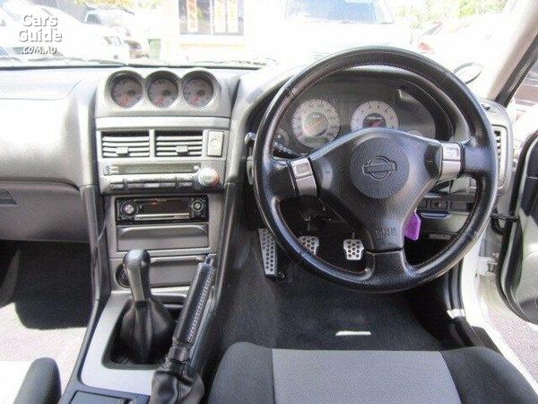 4 door R34 GT-T white Dash cluster.jpg