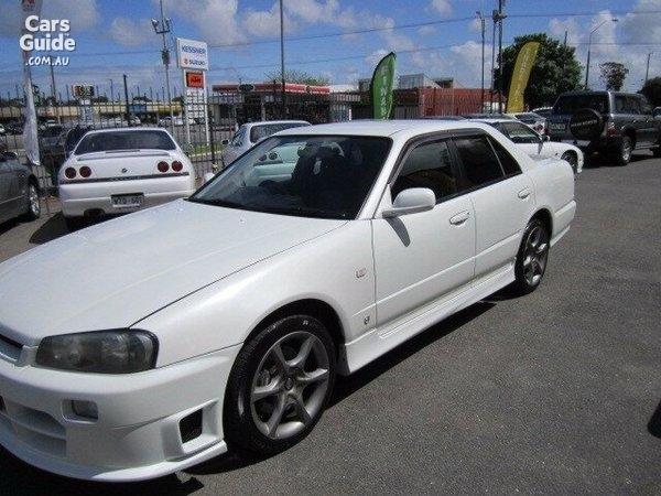 4 door R34 GT-T white Front bumper intake.jpg