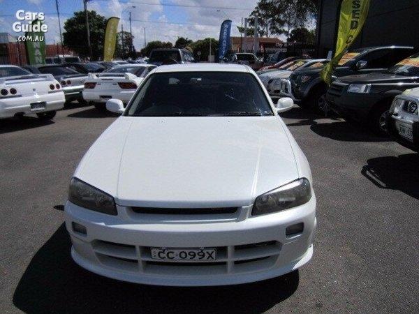 4 door R34 GT-T white Front end.jpg