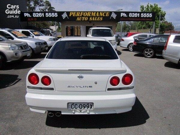 4 door R34 GT-T white Rear tail lights.jpg