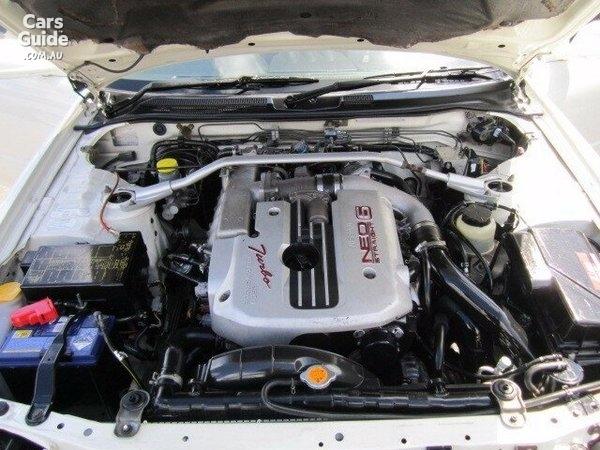 4 door R34 GT-T white engine bay.jpg