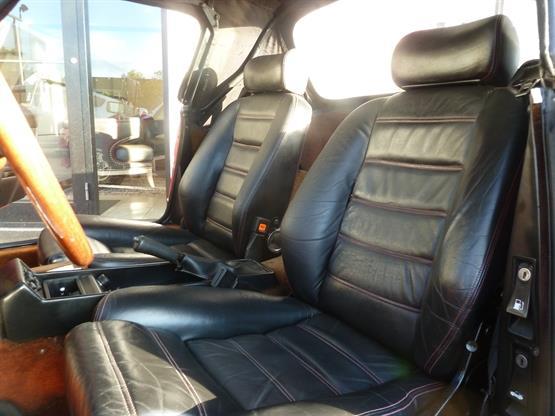 Alpha Romeo Spider Front black leather seats.jpg