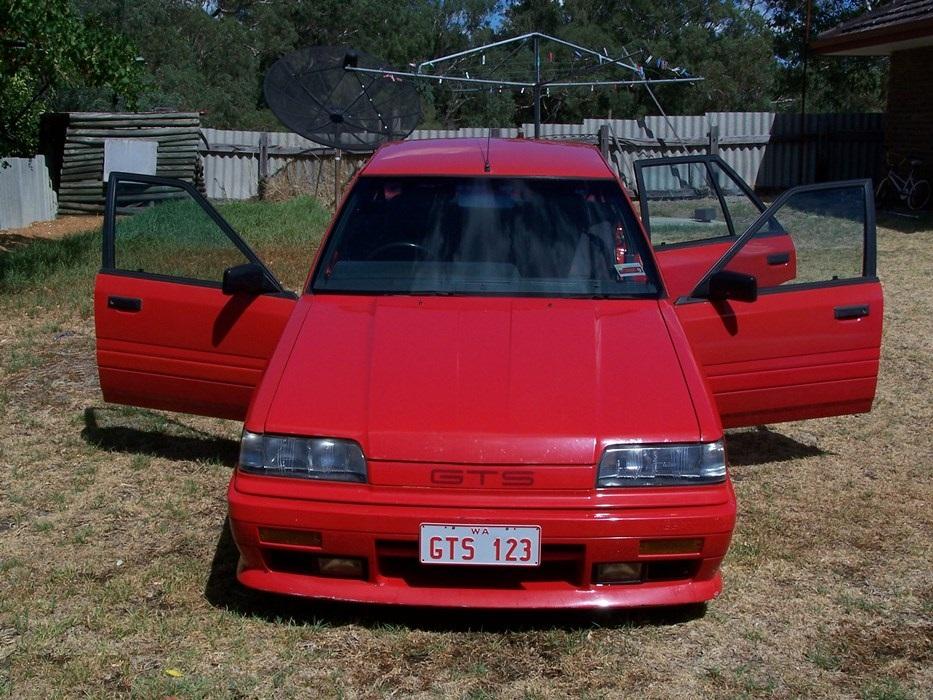 Australian Nissan Skyline Silhouette GTS2 sedan red 1989 (1).jpg