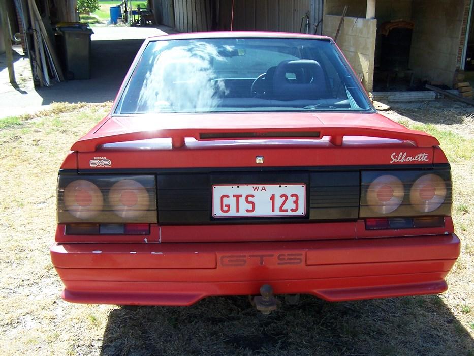 Australian Nissan Skyline Silhouette GTS2 sedan red 1989 (8).jpg