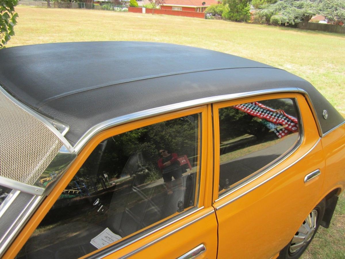 Burnt Orange Datsun 180B Sedan unrestored original Australia (12) vinyl roof.jpg