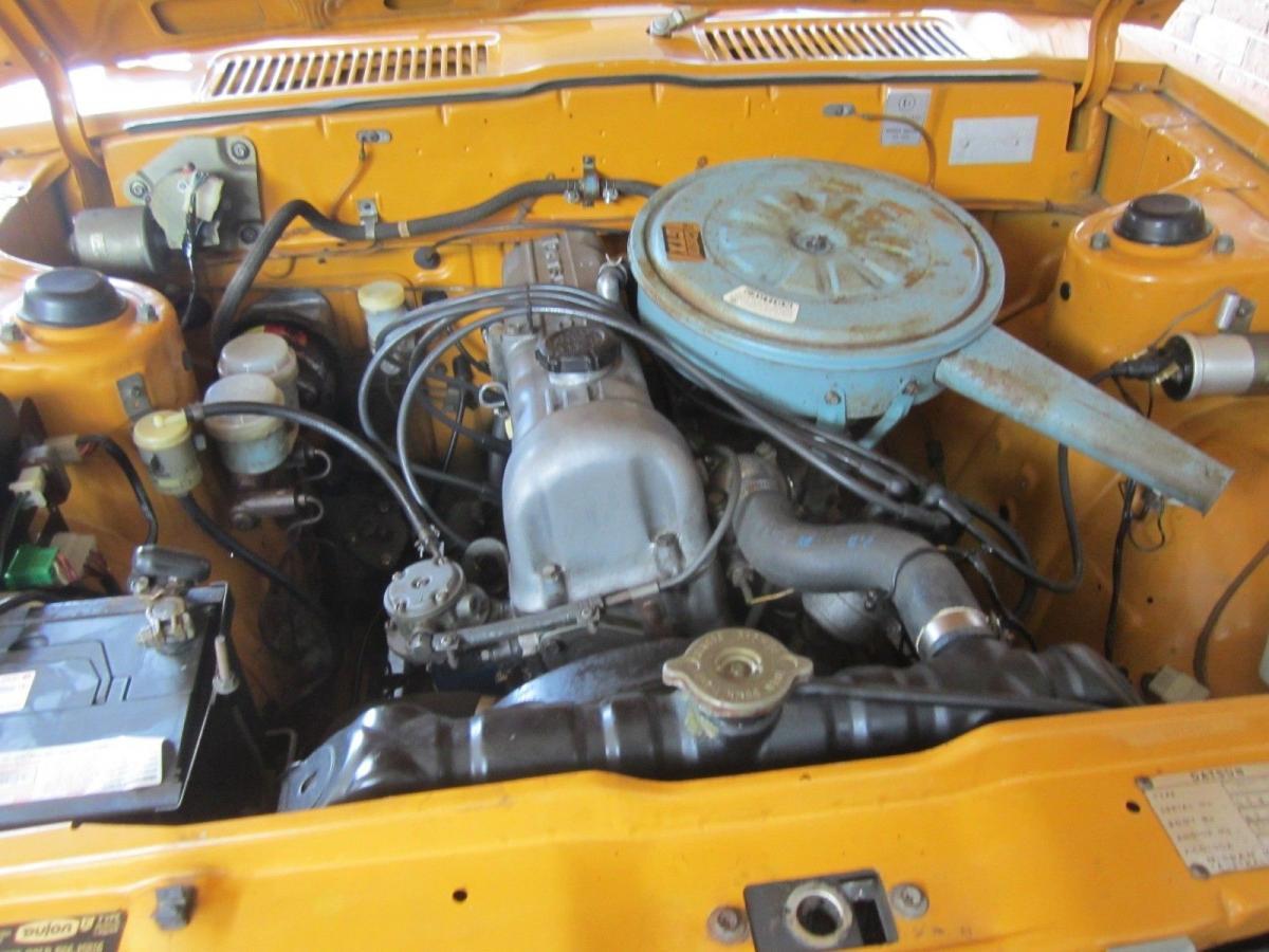 Burnt Orange Datsun 180B Sedan unrestored original Australia engine image.jpg