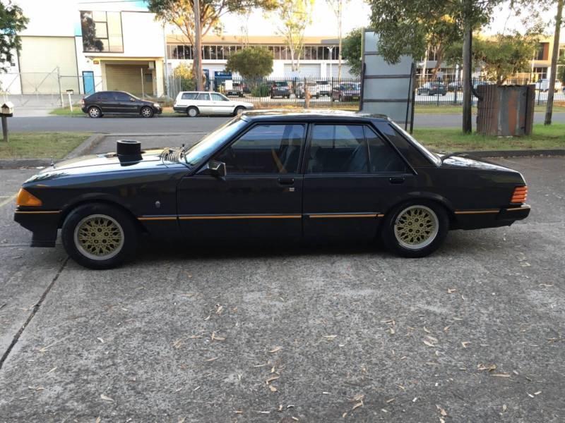 Charcoal on charcoal Ford XE ESP original 6-cylinder carby car 1982 (7).JPG