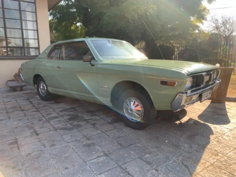 Datsun 260C Coupe 1974 green South Africa RHD rare 2 door (10).png