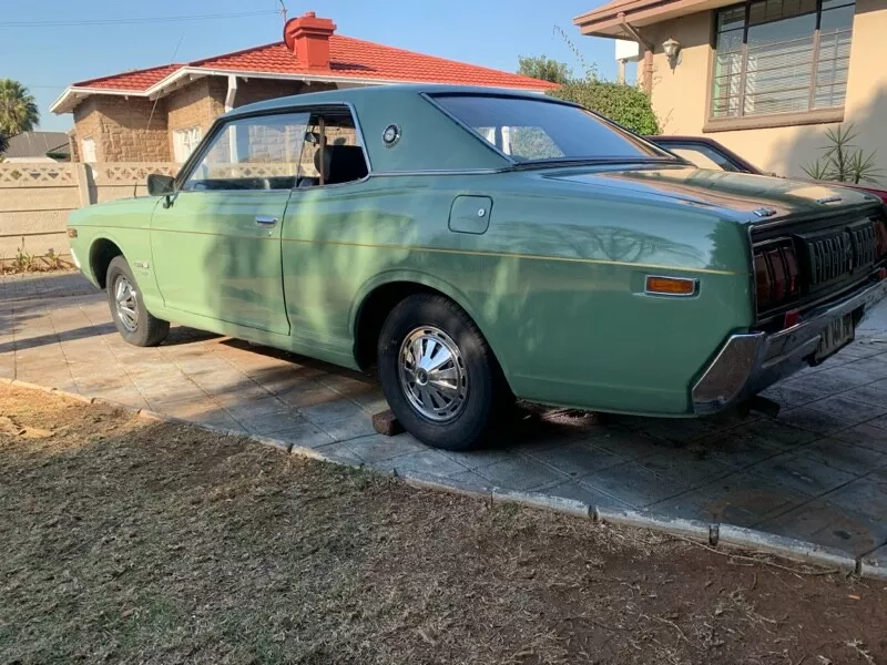 Datsun 260C Coupe 1974 green South Africa RHD rare 2 door (2).png