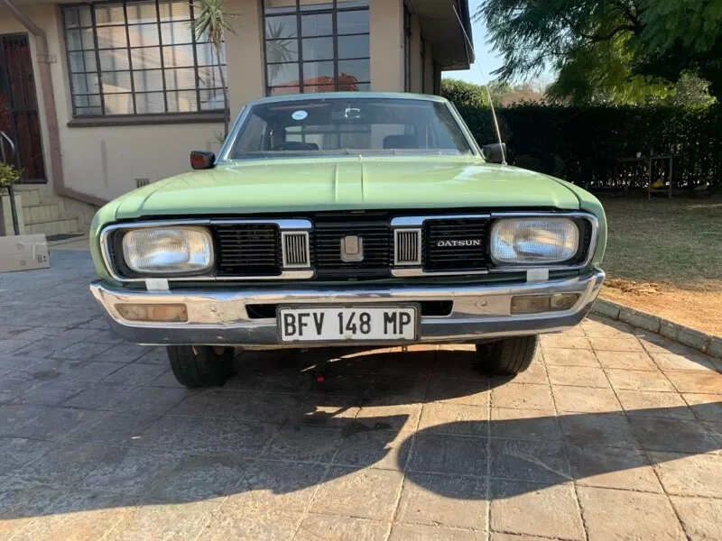 Datsun 260C Coupe 1974 green South Africa RHD rare 2 door (4).png