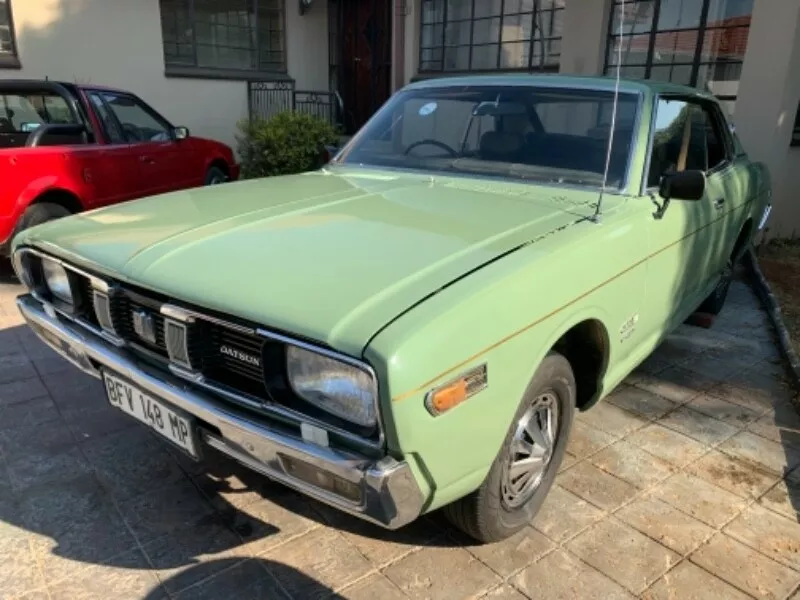 Datsun 260C Coupe 1974 green South Africa RHD rare 2 door (5).png