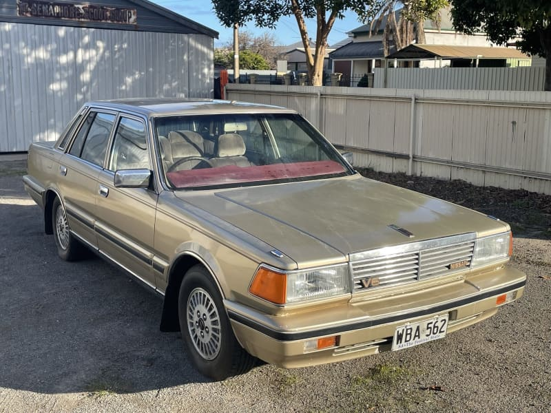 For sale 1985 Nissan 300C Cedric sedan Australia gold (1).png