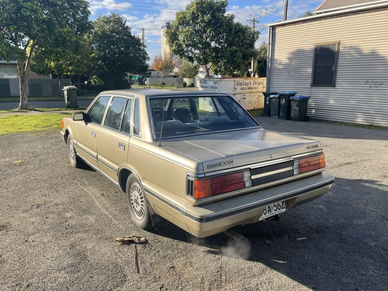 For sale 1985 Nissan 300C Cedric sedan Australia gold (10).png