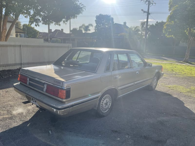 For sale 1985 Nissan 300C Cedric sedan Australia gold (8).png