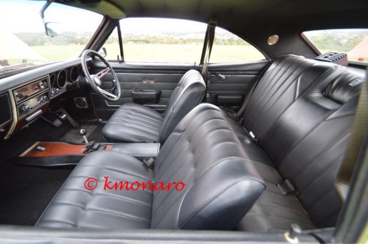 HT Monaro front and rear black seats.jpg