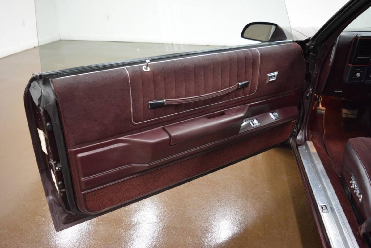 Interior images 1987 Chevy Monte Carlo SS Aerocoupe Maroon burgundy paint (23).jpg