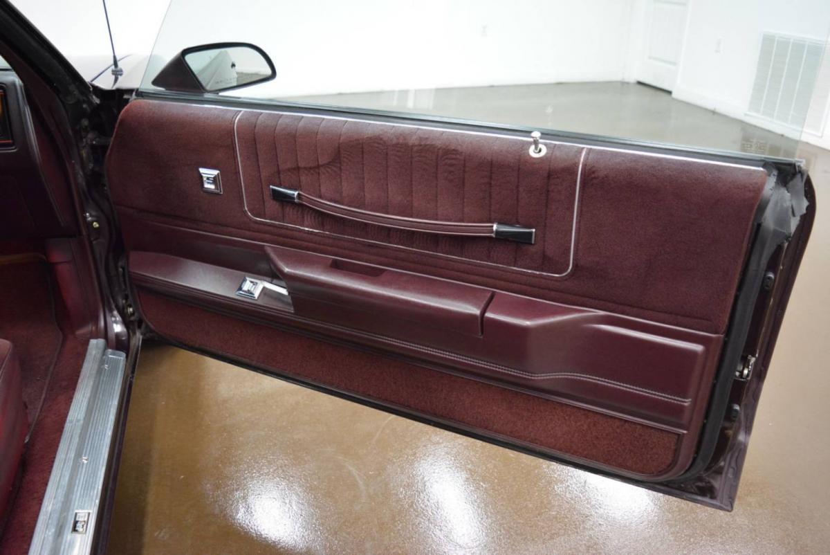 Interior images 1987 Chevy Monte Carlo SS Aerocoupe Maroon burgundy paint (26).jpg