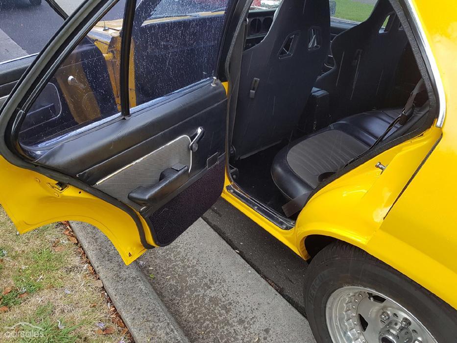 LH 1974 Holden Torana Chrome Yellow with black interior images (8).jpg